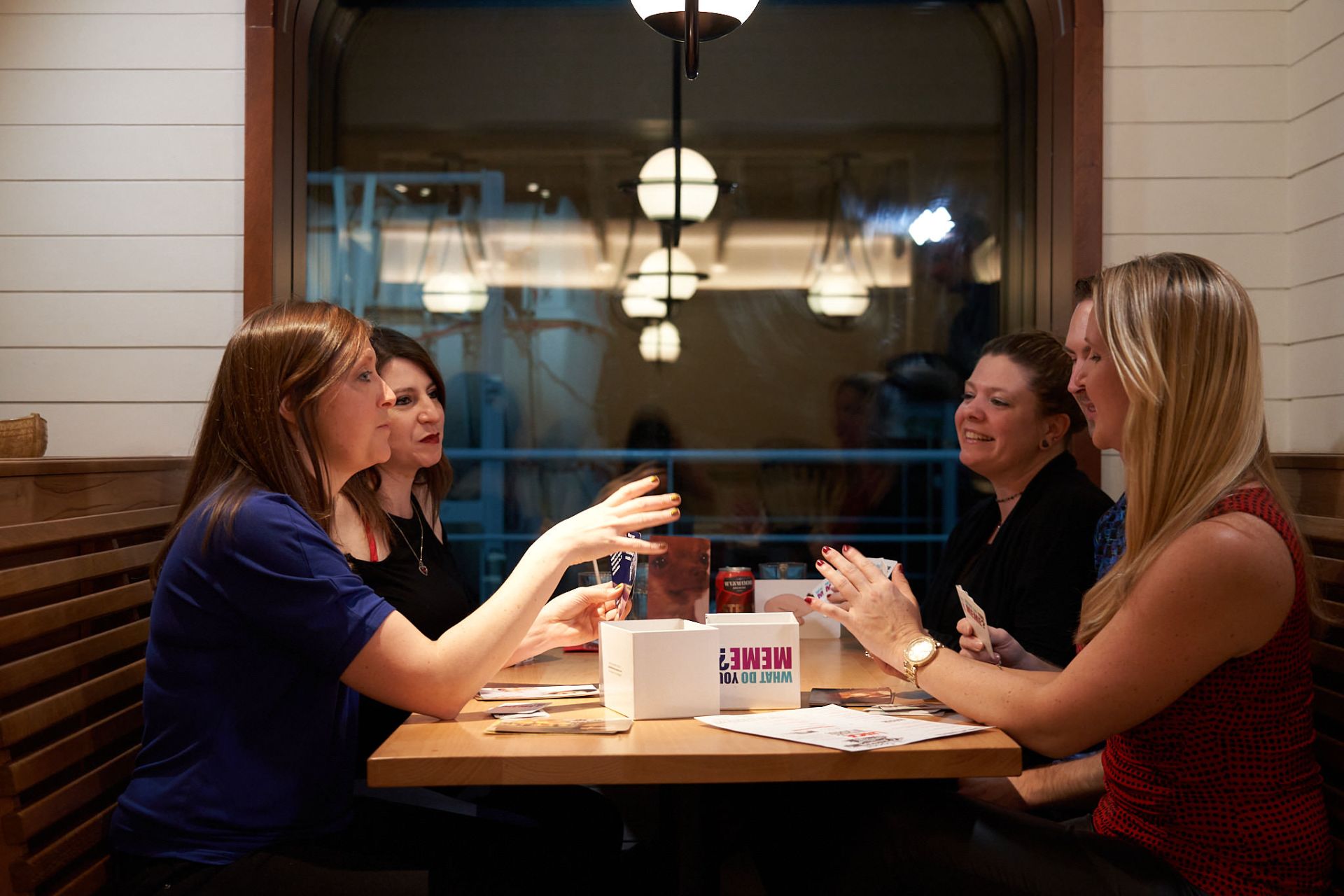 Friends playing a card game together